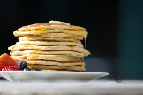 Pancakes on a plate. Photo by Luke Pennystan on Unsplash.