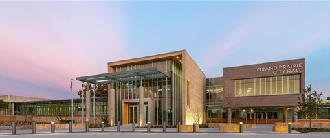 View of the outside of City Hall at sunset